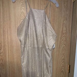 This is a David’s Bridal dress. Size 18 and about knee length